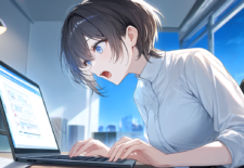 ブラウザを開いてびっくりしている女性
